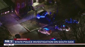 Illinois State Police surround vehicle in Chicago's West Woodlawn neighborhood