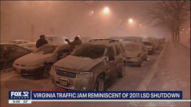 Motorists stranded on East Coast interstate, reminiscent of Chicago's Lake Shore Drive in 2011