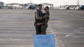 Marine husband, Air Force wife reunited by deployment