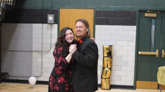 She said yes! Man proposes to girlfriend at old high school gym to make up for bad prom experience