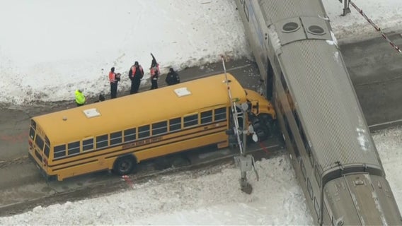 Orland Park school bus, train collision: Hero bus driver escorts children off before Metra strikes bus