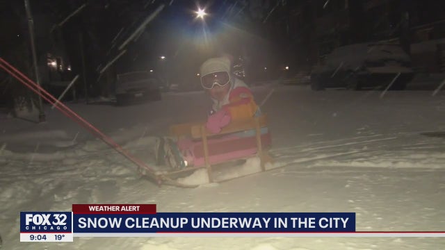 Chicagoans break out the shovels, kids enjoy snow after whiteout conditions snarl evening commute