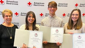 Suburban Chicago lifeguards honored for saving woman who collapsed during water aerobics class in Joliet