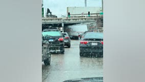 Truck stuck under viaduct on Chicago's South Side