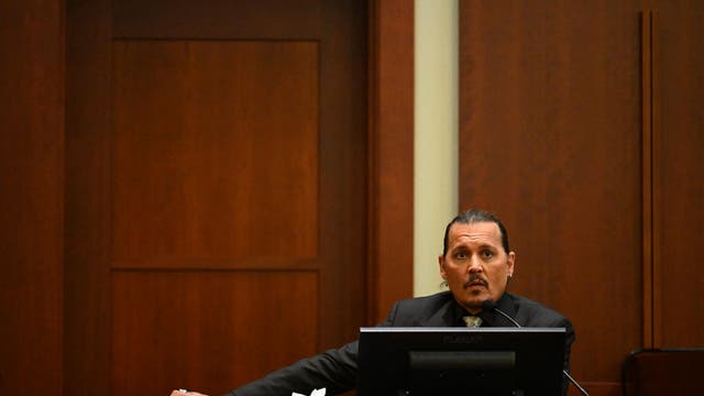 Johnny Depp takes stand in trial against ex-wife Amber Heard: 'Six years of trying times'