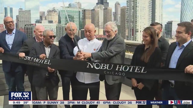Robert De Niro toasts to the opening of Nobu Chicago in the West Loop
