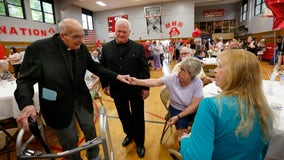 Father Al Adamich: Catholic church in Evergreen Park celebrates priest's 100th birthday