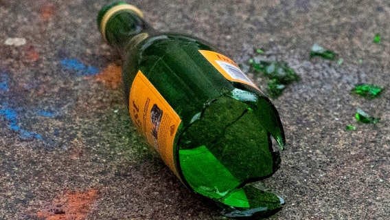 Woman bashes man over head with bottle, stabs him in SWAT incident