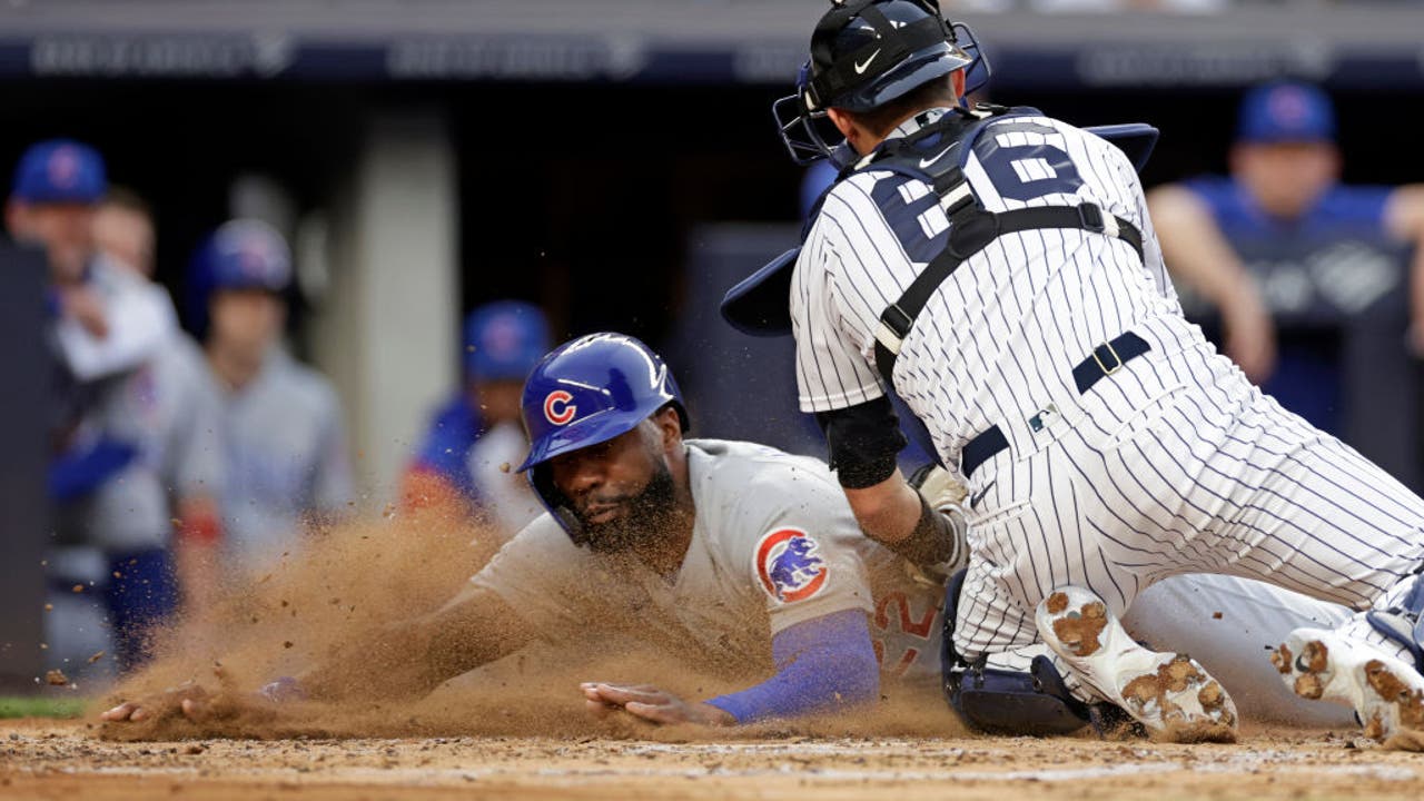 Red-hot Yankees edge Cubs 2-1 in 13