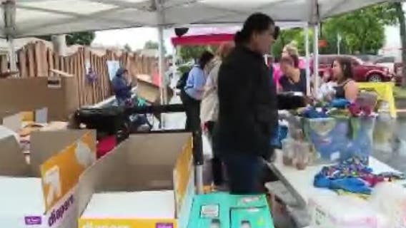 Families pick up free diapers and baby clothes on Southwest Side at event in honor of murdered mother