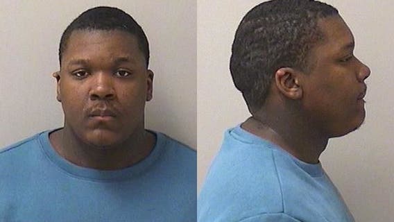 Aurora man charged illegally possessing stolen car, guns