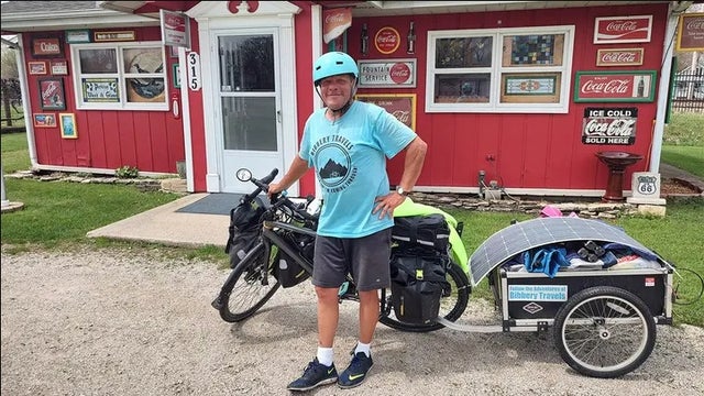 New York man cycling across America is bitten by dog in Illinois