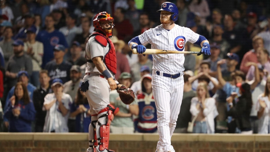 Cards rally past Cubs in 11 innings, take rubber game