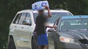 Boy selling water at busy Atlanta intersection fires shots, witness says