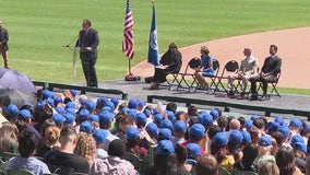 More than 700 immigrants become US citizens at Chicago's Wrigley Field