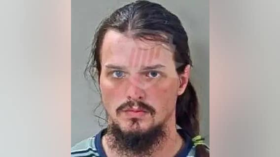 Man requests police ride along, arrested after routine background check shows child rape indictments