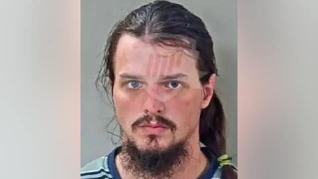 Man requests police ride along, arrested after routine background check shows child rape indictments