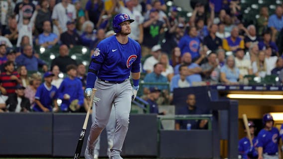 Happ’s homers help Cubs defeat Brewers 4-3 in 10 innings