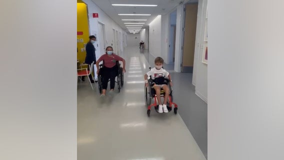 Highland Park shooting victim Cooper Roberts doing better, took part in wheelchair race