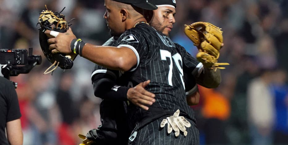 Jose Abreu and Yoan Moncada of the Chicago White Sox celebrate a win