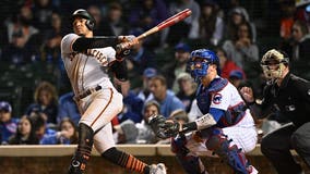 Estrada, Flores homer in late innings, Giants beat Cubs 4-2