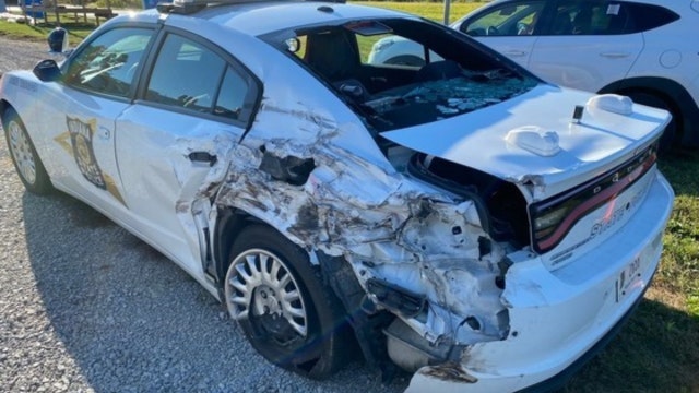 Indiana State Police squad car sideswiped by tanker truck