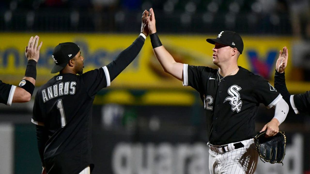 Chicago White Sox's Gavin Sheets (32) celebrates with Elvis Andrus (1)  after hitting a home run