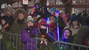 Hundreds fill the streets in downtown Aurora as the city transforms into a winter wonderland
