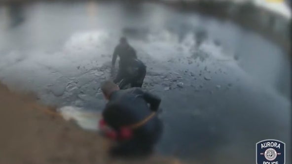 Heroic video shows officers braving icy water to save little boy downing in Aurora