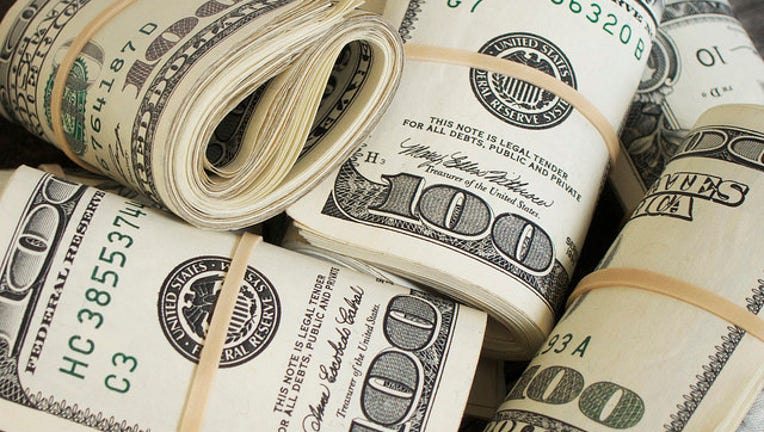 1407b395-1033dd3d-money-rolls-404023.jpg