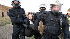 Greta Thunberg carried away by police at German coal mine protest