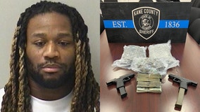 Chicago man arrested for possessing guns, drugs during traffic stop in Aurora