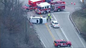 SUV stuck on its side after crash in Chicago's SW suburbs