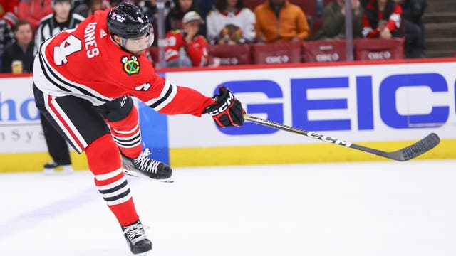 Bertuzzi helps Chicago beat San Jose 4-2 in the Blackhawks' home opener