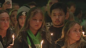 Michigan State University Spartans hold vigil in Chicago for victims of campus mass shooting