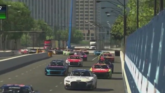 Johnson hands out hundreds of free NASCAR tickets to kids in Chicago