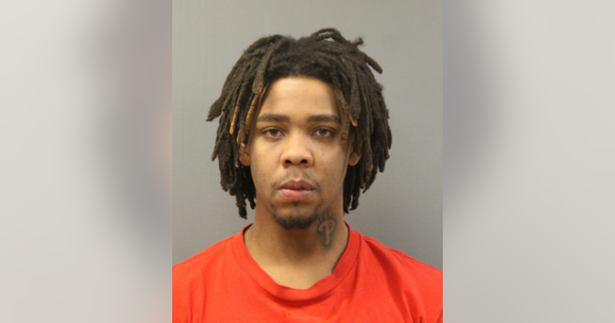 Man charged in death of woman hit by stray bullet while exiting car in ...