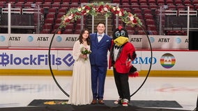 Blackhawks fans get married on the ice in Chicago