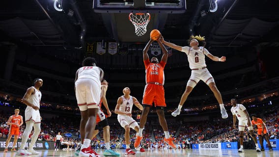 Arkansas holds off Illinois 73-63 with big defensive effort