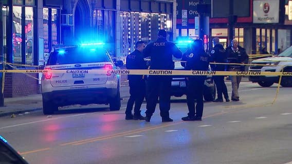 2 shot while inside Chicago business