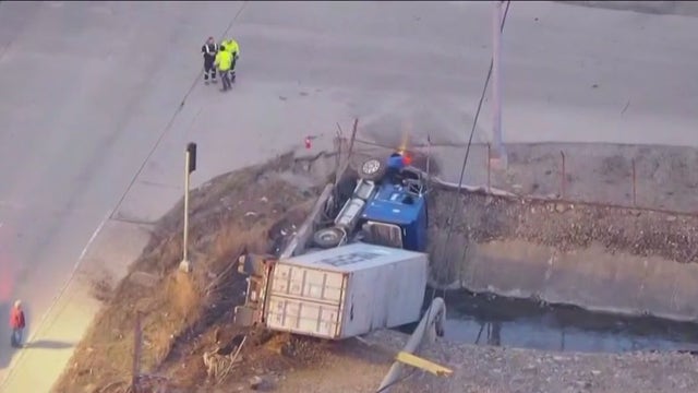 Semi rolls over into ditch in Channahon
