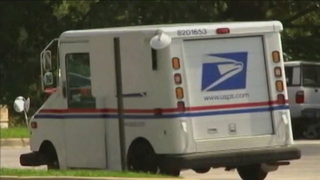 Cook County mail carrier robbed at gunpoint: police