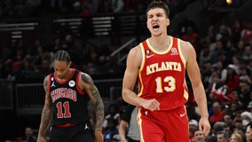 Bogdanovic leads Young-less Hawks past Bulls 123-105