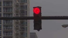 Cook County couple forced to pay red light ticket for vehicle that wasn't theirs