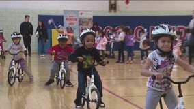 NASCAR, Chicago Street Race donate helmets, bikes to local children