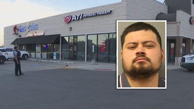 Man charged with driving over 4 people in Chicago parking lot after argument