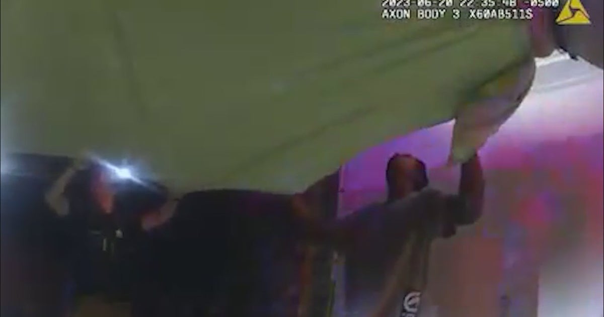 Chilling video shows rescue of child trapped in Peoria apartment fire ...