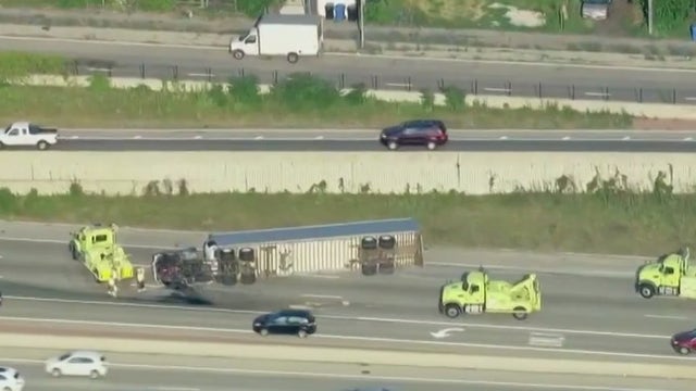 Overturned semi blocks outbound Dan Ryan Expressway