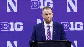 Northwestern interim coach fends for himself as Wildcats players skip annual Big Ten kickoff