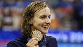 Katie Ledecky ties Michael Phelps record at Worlds with gold medal finish in 1,500-meter freestyle